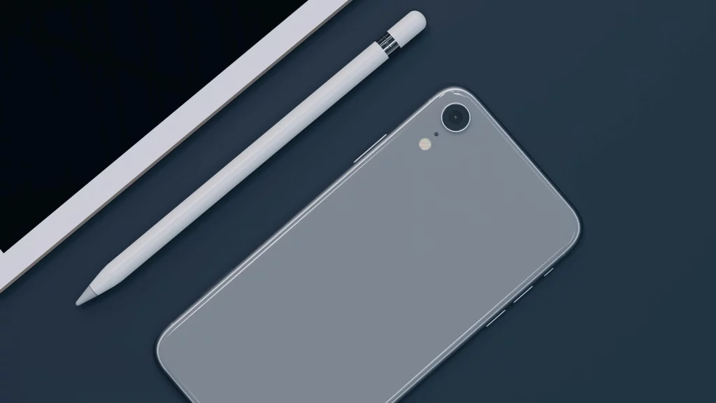 IPhone mit einem Apple Pencil und einem IPad im Anschnitt. auf dem IPhone fehlt das Logo